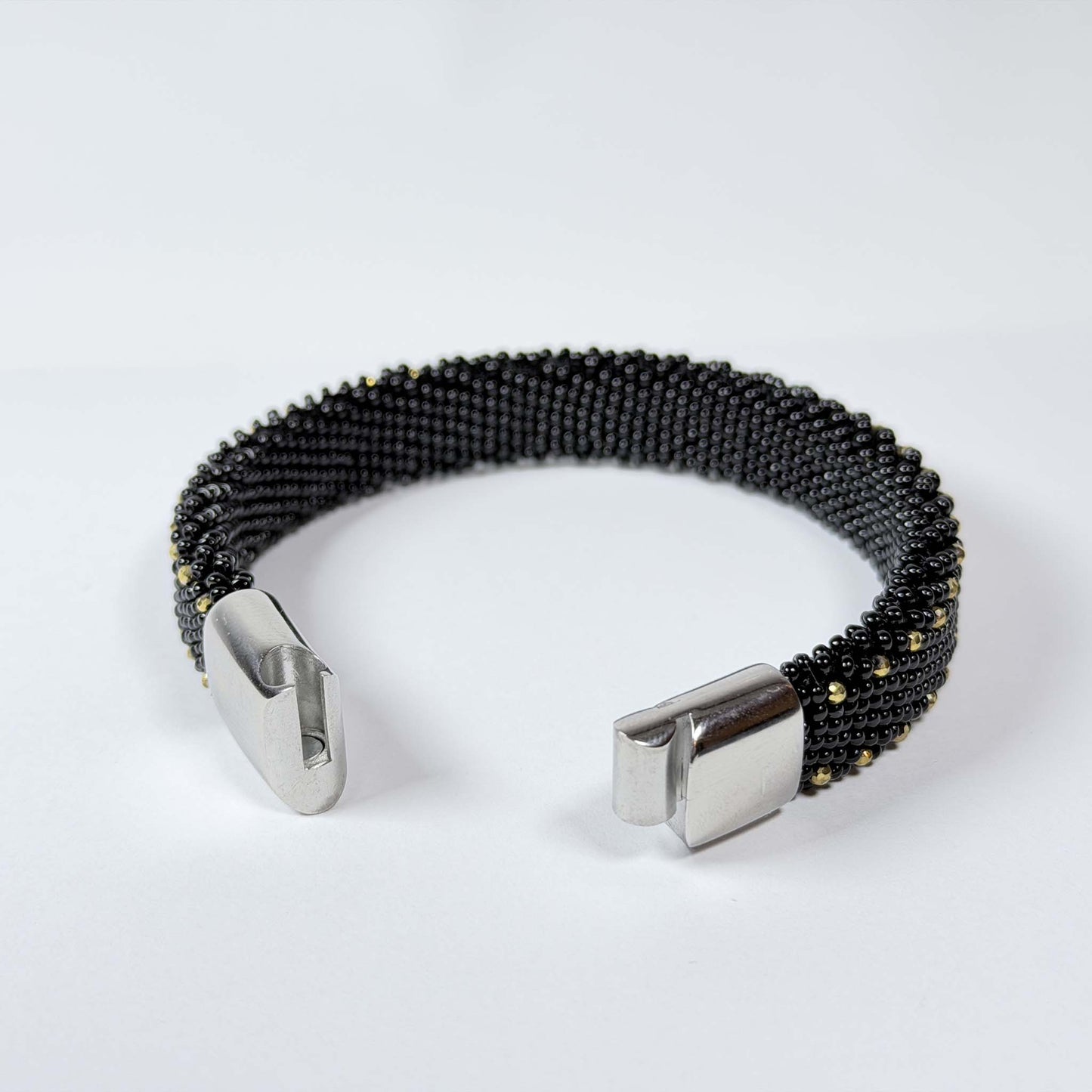 Black (gold color dots)