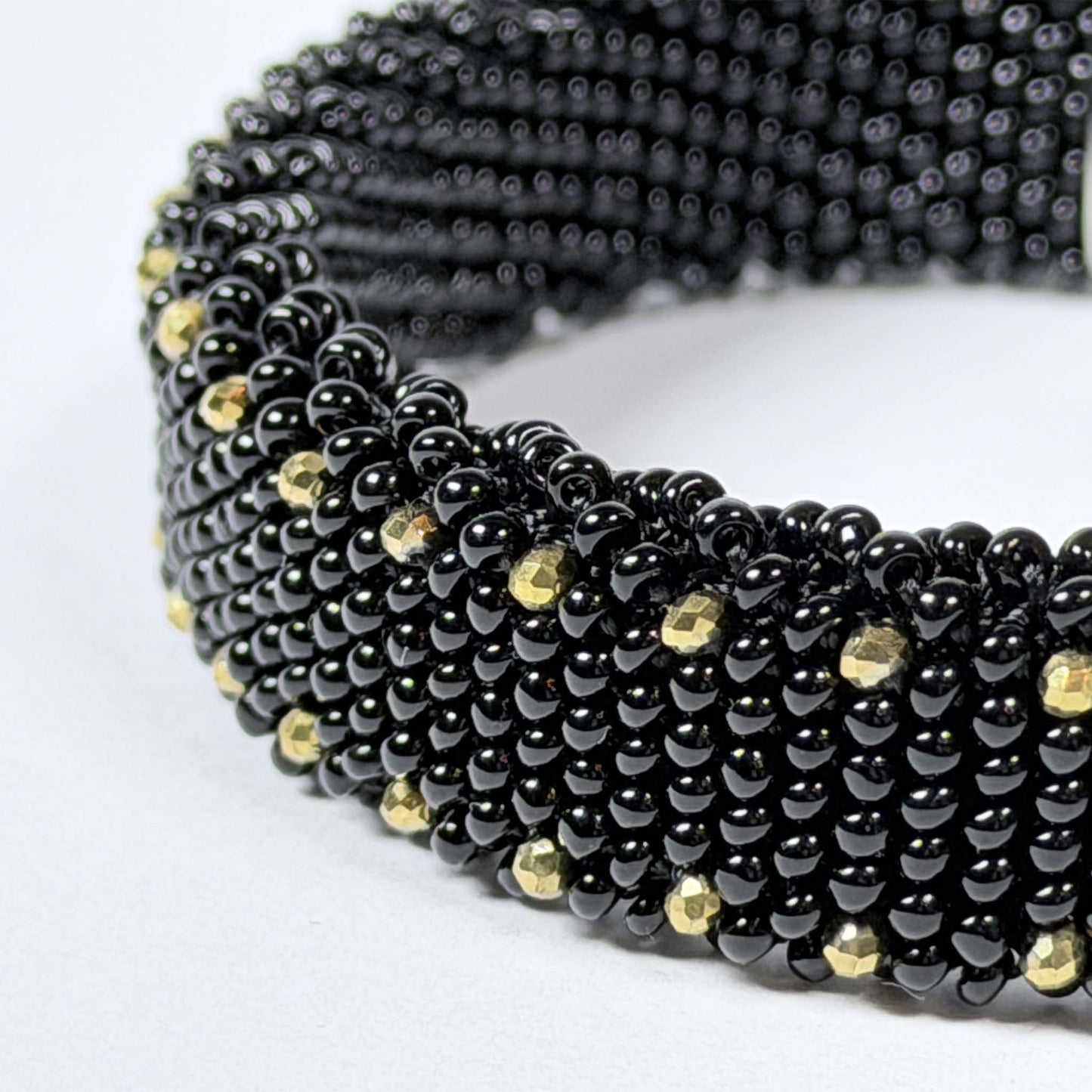 Black (gold color dots)
